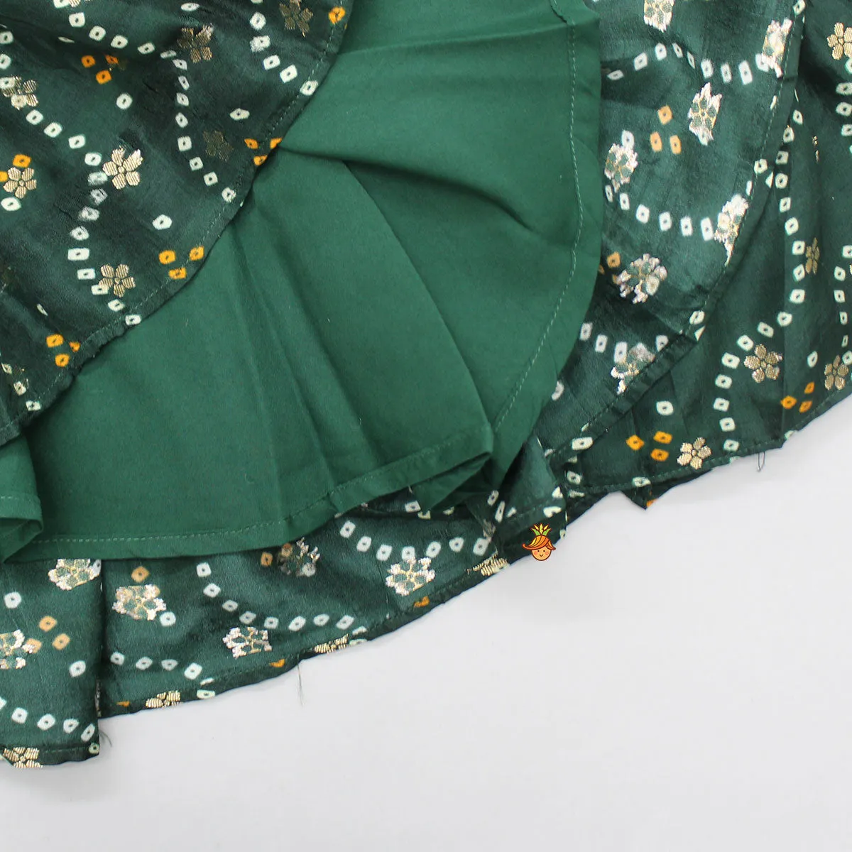 Bandhani Printed Ruffled Yoke Green Top And Lehenga With Net Dupatta