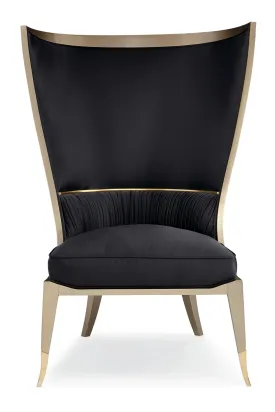 Black Curved Wingback Chair | Caracole Pop Your Collar