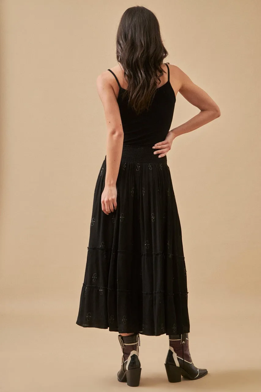 Long black embroidered skirt by NKN